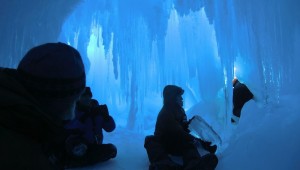 Students in an ice cave on the Erbus Ice Tongue