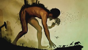 Man grabbing environment with a city on his back.