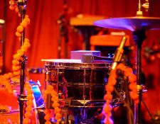 This photo of drums, cymbal, and microphone connects with areas of the book that discuss the rhythms of music, and their effects on physiological processes, exercise, and therapeutic benefits, as well as social justice concerns of equality, mutual respect, personal dignity, and individual and communal autonomy. Further, at every age we find people "making music" as they tap their foot or drum along with the songs and musical sounds they hear. Thus, the drum is one of the most popular musical instruments -- one that expresses rhythms of life that are universally known and understood, and whose sounds directs us onto pathways where we may discover new opportunities for self-expression and ways of becoming.