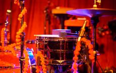 This photo of drums, cymbal, and microphone connects with areas of the book that discuss the rhythms of music, and their effects on physiological processes, exercise, and therapeutic benefits, as well as social justice concerns of equality, mutual respect, personal dignity, and individual and communal autonomy. Further, at every age we find people "making music" as they tap their foot or drum along with the songs and musical sounds they hear. Thus, the drum is one of the most popular musical instruments -- one that expresses rhythms of life that are universally known and understood, and whose sounds directs us onto pathways where we may discover new opportunities for self-expression and ways of becoming.