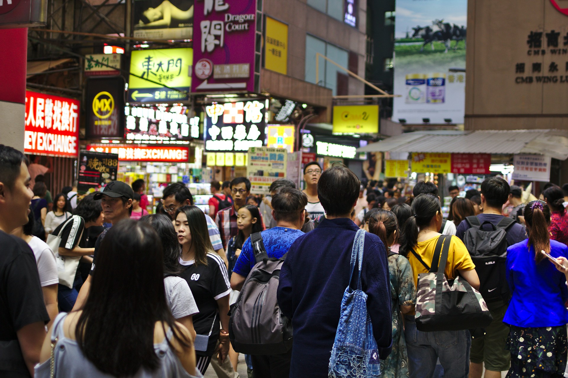 Photo of a crowd of people walking in Hong Kong