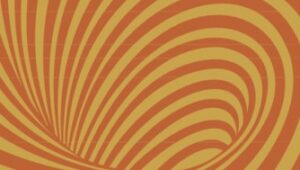 Cover of The Coup Trap featuring a yellow and orange spiral